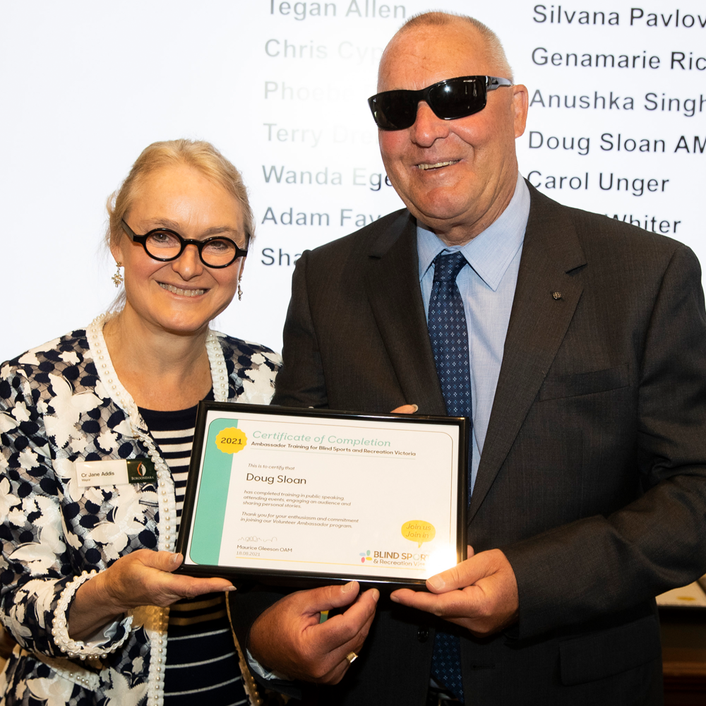 Doug Sloan OAM receiving Ambassador Certificate